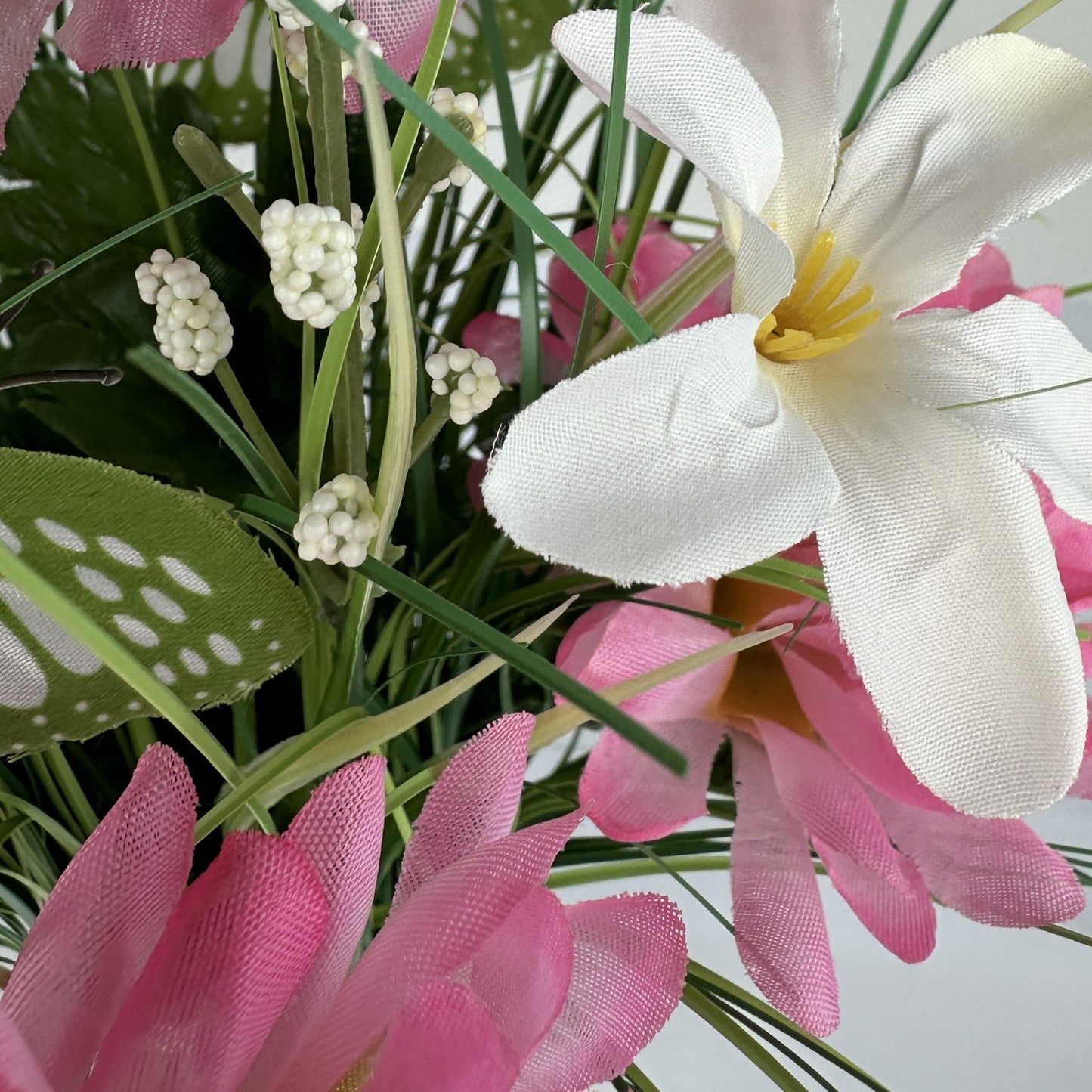 Artificial Grass, Pink Forsythia and Wild Flower Arrangement with Butterflies